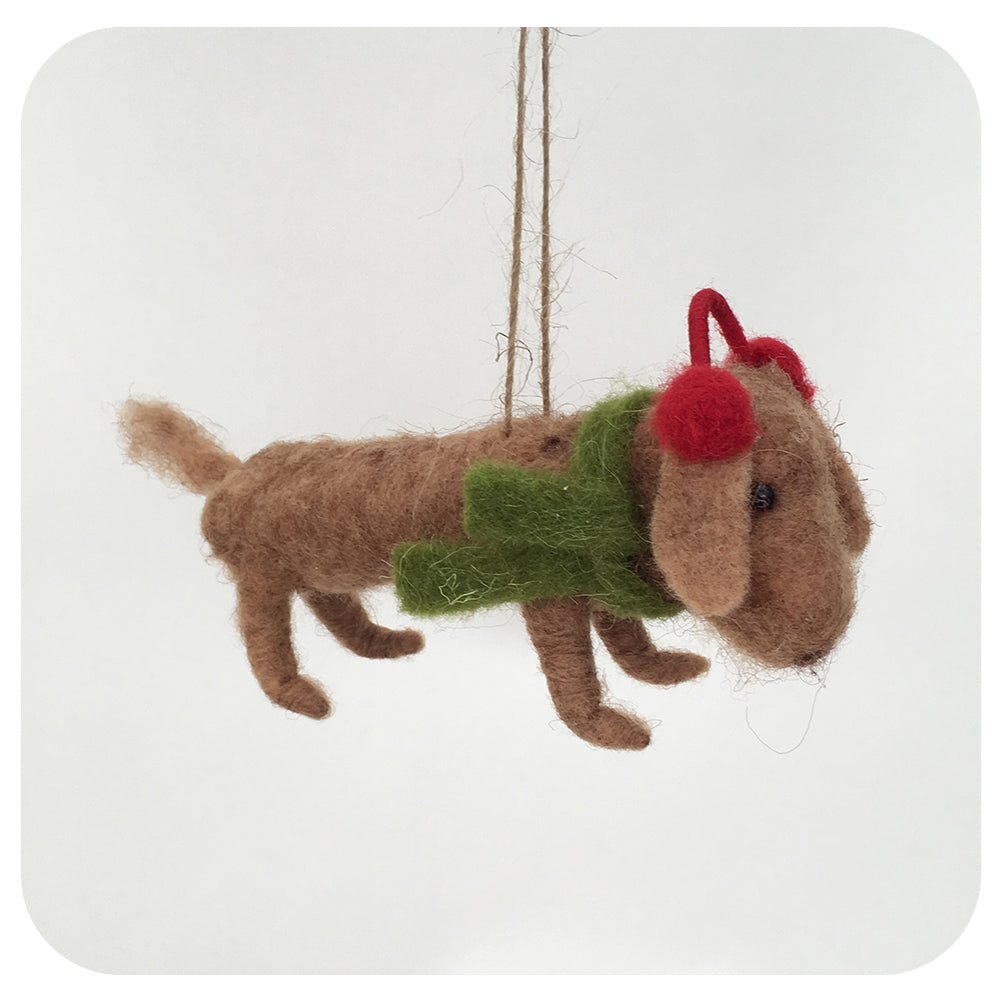 Weiner Dog with Ear Muffs