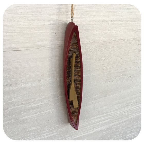 Red Canoe with Paddles